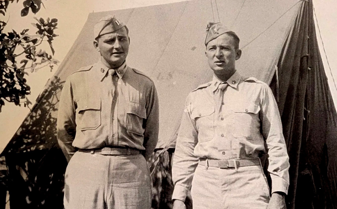 John Leech and a fellow officer in uniform outside an Army tent